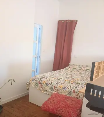 Un ou plusieurs lits dans un hébergement de l'établissement Studio centre bourg