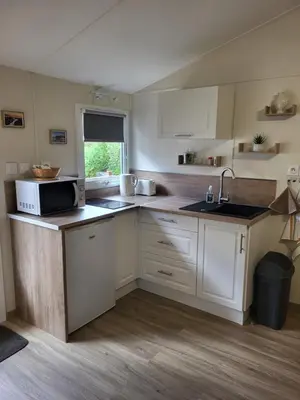 Cuisine ou kitchenette dans l'établissement Gîte Sous le Tilleul