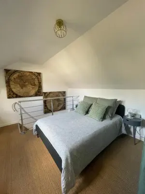Un ou plusieurs lits dans un hébergement de l'établissement Duplex casa verde