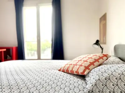 Un ou plusieurs lits dans un hébergement de l'établissement NaonedLoft au Coeur de la Ville