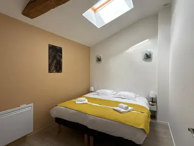 Un ou plusieurs lits dans un hébergement de l'établissement Le Verger - Gite 8 personnes en campagne et rivière By Primo