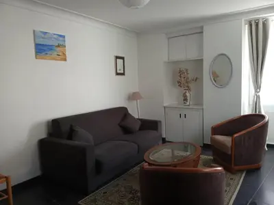 Coin salon dans l'établissement Maison de bourg