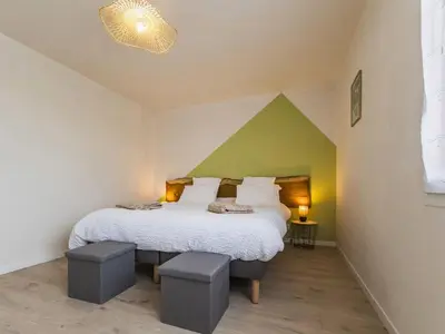 Un ou plusieurs lits dans un hébergement de l'établissement Gîte au calme avec terrasse, proche Nantes - FR-1-306-1301