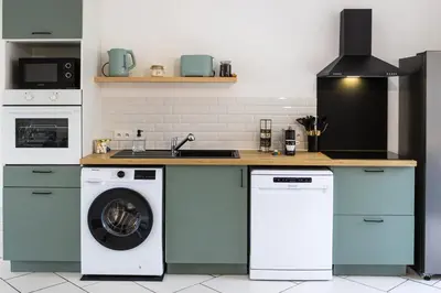 Cuisine ou kitchenette dans l'établissement L'Alcôve, Maison 3ch avec jardin et parking