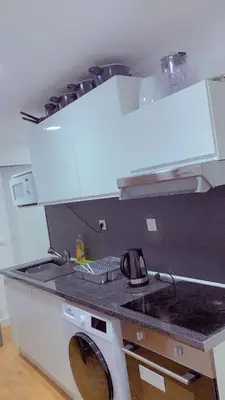 Cuisine ou kitchenette dans l'établissement Manuela Home