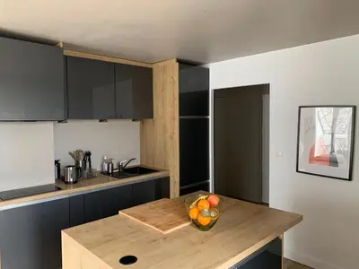 Cuisine ou kitchenette dans l'établissement Relaxant chambre à Île de Nantes