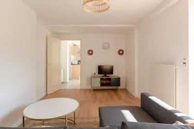 Télévision ou salle de divertissement dans l'établissement T2-Centre-ville-Parking