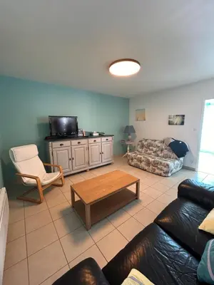 Coin salon dans l'établissement Maison de Famille La Bernerie