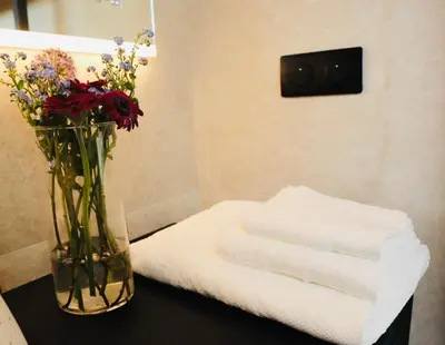 Un ou plusieurs lits dans un hébergement de l'établissement Suite Jacuzzi privatif Li Li et Rose