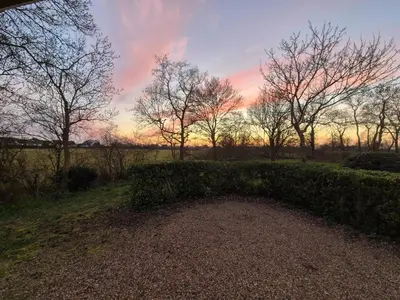 Lever ou coucher de soleil vu de la maison de vacances ou à proximité