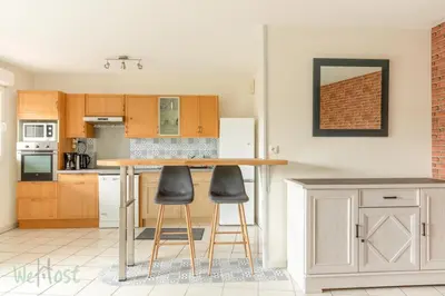 Cuisine ou kitchenette dans l'établissement FRANCIS LE CARVAL - REZE - balcon - parking