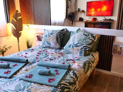 Un ou plusieurs lits dans un hébergement de l'établissement Romance&Tentation-Balnéo 2 places