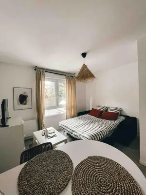 Un ou plusieurs lits dans un hébergement de l'établissement Studio cosy Ile de Nantes proche tram ligne 2 et 3