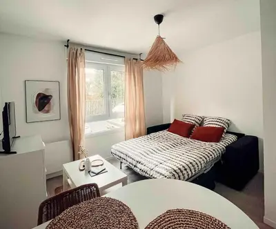 Un ou plusieurs lits dans un hébergement de l'établissement Studio cosy Ile de Nantes proche tram ligne 2 et 3