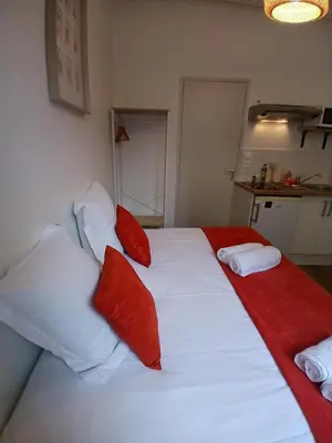 Un ou plusieurs lits dans un hébergement de l'établissement STUDIO CENTRE VILLE ANGERS RDC - 2 personnes