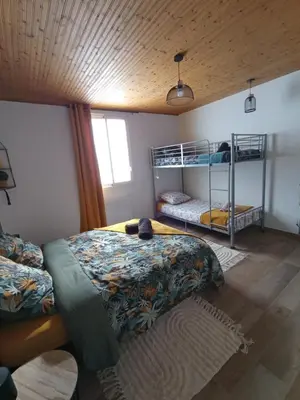 Un ou plusieurs lits dans un hébergement de l'établissement La maisonnette de Gaby