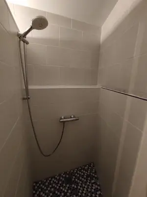 Salle de bains dans l'établissement Appartement des machines