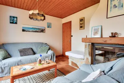 Coin salon dans l'établissement Maison avec jardin à 400m de la plage des Sableaux