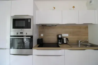 Cuisine ou kitchenette dans l'établissement Au petit jardin d Aizenay