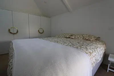 Un ou plusieurs lits dans un hébergement de l'établissement Au petit jardin d Aizenay