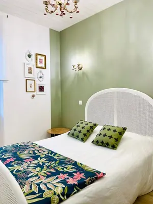 Un ou plusieurs lits dans un hébergement de l'établissement Maison plage centre ville typique