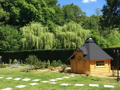 Jardin de l'établissement Les Roulottes De La Basse Maunerie