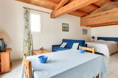 Un ou plusieurs lits dans un hébergement de l'établissement Maison pour 10 avec jardin à Noirmoutier