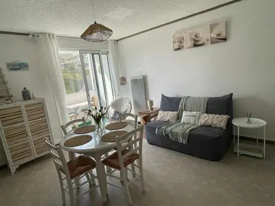 Coin salon dans l'établissement Les Dunes