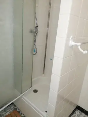 Salle de bains dans l'établissement Les Dunes