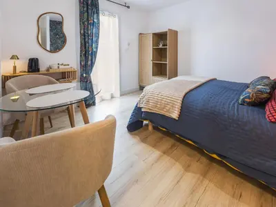 Un ou plusieurs lits dans un hébergement de l'établissement Chambre cosy avec terrasse privative et wifi à Missillac - FR-1-306-1306