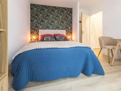 Un ou plusieurs lits dans un hébergement de l'établissement Chambre cosy avec terrasse privative et wifi à Missillac - FR-1-306-1306