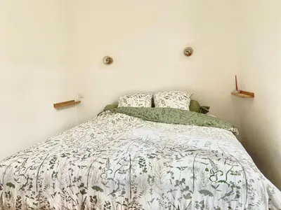 Un ou plusieurs lits dans un hébergement de l'établissement Grand studio rénové avec goût au coeur d'Angers, Centre des Congrès