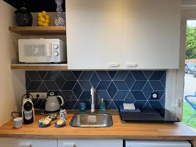 Cuisine ou kitchenette dans l'établissement Studio proche aeroport Nantes