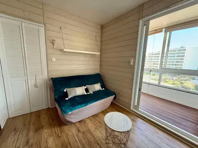 Un ou plusieurs lits dans un hébergement de l'établissement Appartement au bord de la mer avec parking à Saint-Hilaire-de-Riez - FR-1-652-55