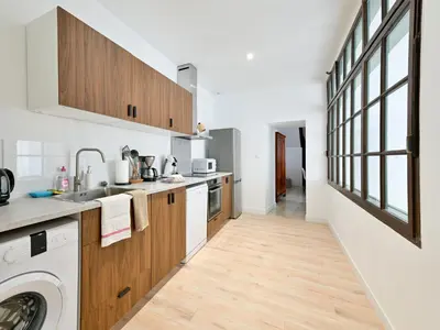 Cuisine ou kitchenette dans l'établissement Le Recoin Serein, Charme et Modernité