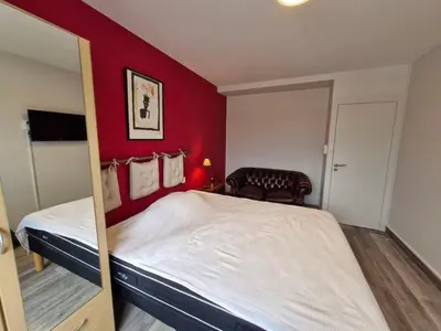 Un ou plusieurs lits dans un hébergement de l'établissement Grand balcon face mer appartement 2 chambres rénové