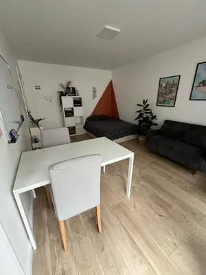 Coin salon dans l'établissement Les Tulipiers