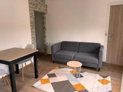 Coin salon dans l'établissement Appartement T3 - Plage à 500m