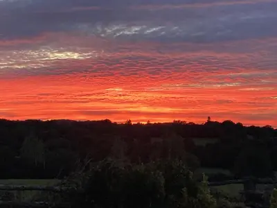 Lever ou coucher de soleil vu de la maison de vacances ou à proximité