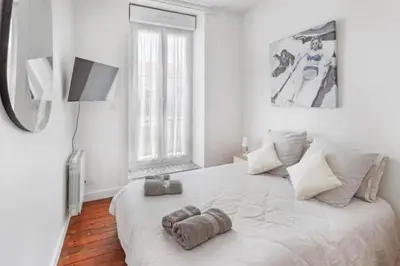 Un ou plusieurs lits dans un hébergement de l'établissement 3 chambres à 200m mer et commerces