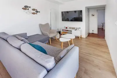 Coin salon dans l'établissement 3 chambres à 200m mer et commerces