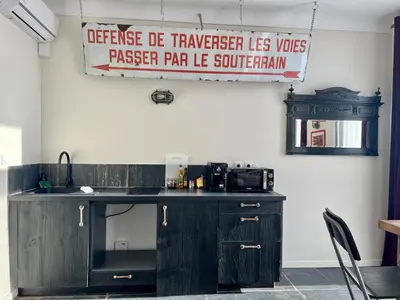 Cuisine ou kitchenette dans l'établissement Exclusivité - La Maison à Vapeur