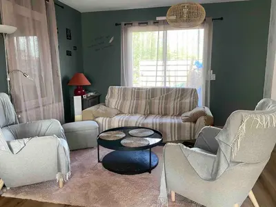 Coin salon dans l'établissement House for your vacation or your colleagues