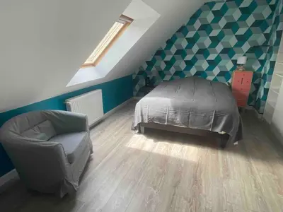 Un ou plusieurs lits dans un hébergement de l'établissement House for your vacation or your colleagues