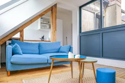 Coin salon dans l'établissement Appartement très lumineux - vue sur la ville - 4 personnes