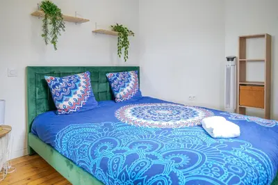 Un ou plusieurs lits dans un hébergement de l'établissement Appartement très lumineux - vue sur la ville - 4 personnes