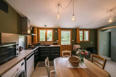 Cuisine ou kitchenette dans l'établissement La Maison de Dom