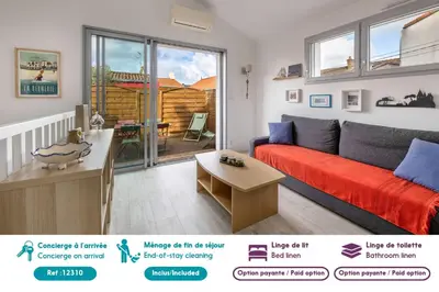 Coin salon dans l'établissement Appart dans bourg a 230m de la plage - 4 pers
