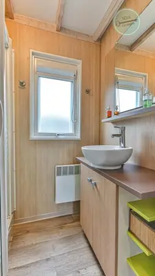Cuisine ou kitchenette dans l'établissement Chalet Village de la Mer