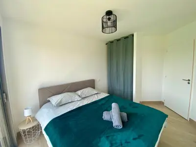 Un ou plusieurs lits dans un hébergement de l'établissement La Colinette Chambretaud - 5min du PuyDuFou